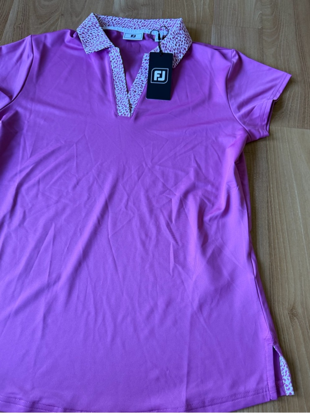 Footjoy NWT women’s cap sleeve berry purple women’s polo shirt size small